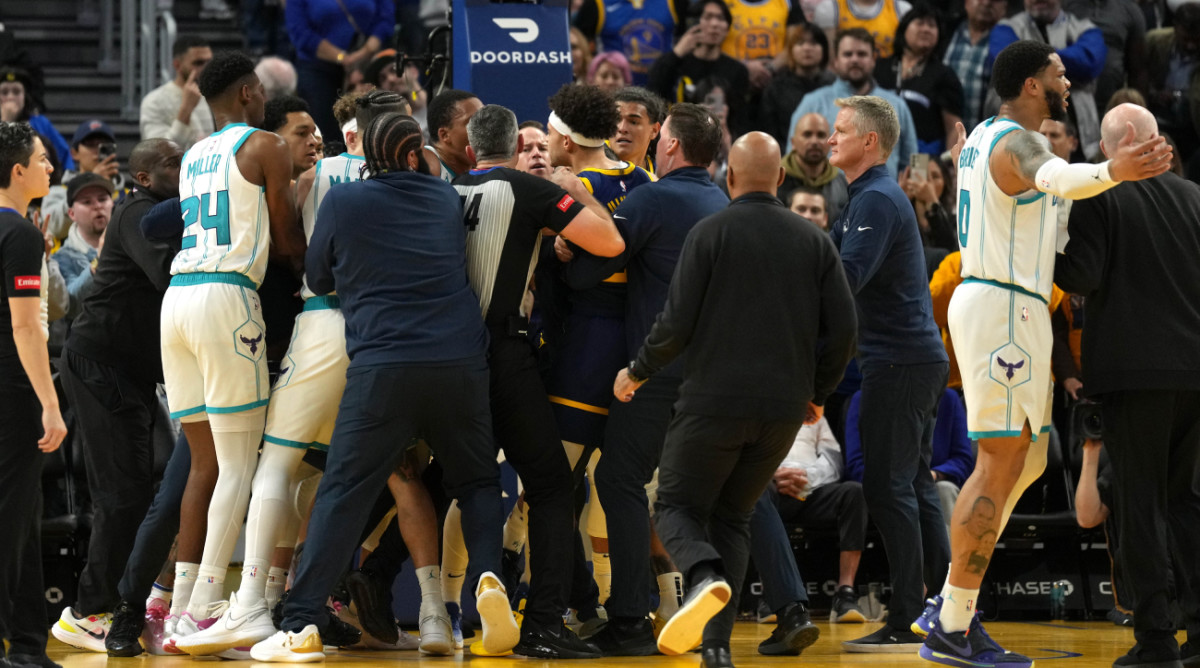 Members of the Golden State Warriors and Charlotte Hornets have to be separated at the end of a game.